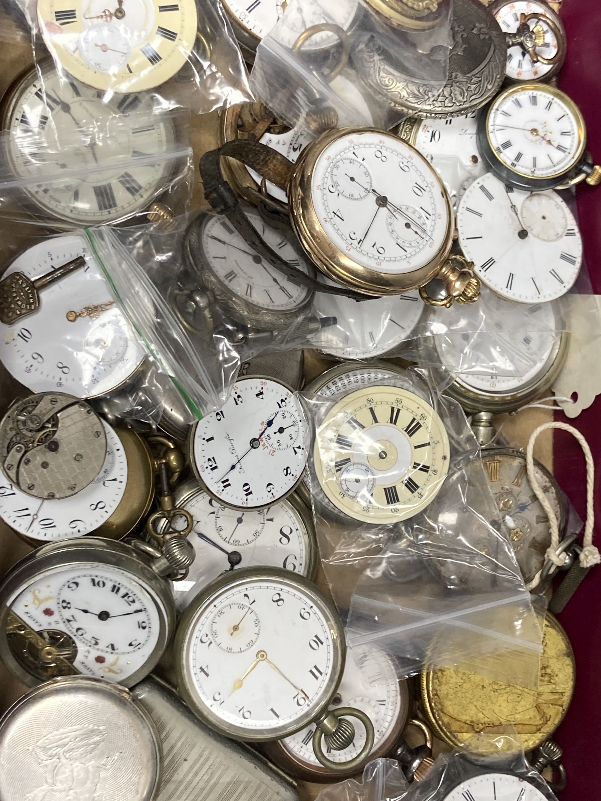 A group of assorted bass metal pocket and fob watches and a small quantity of movements.